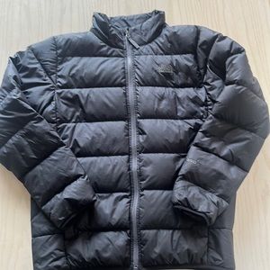 Boys 550 Fill puffer with Dark Gray Writing as the North Face